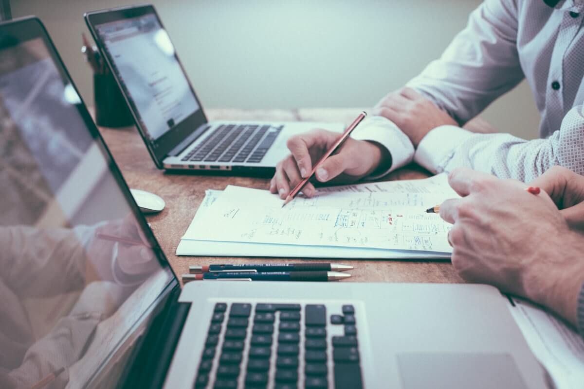 Professional reviewing shipping and logistics documentation